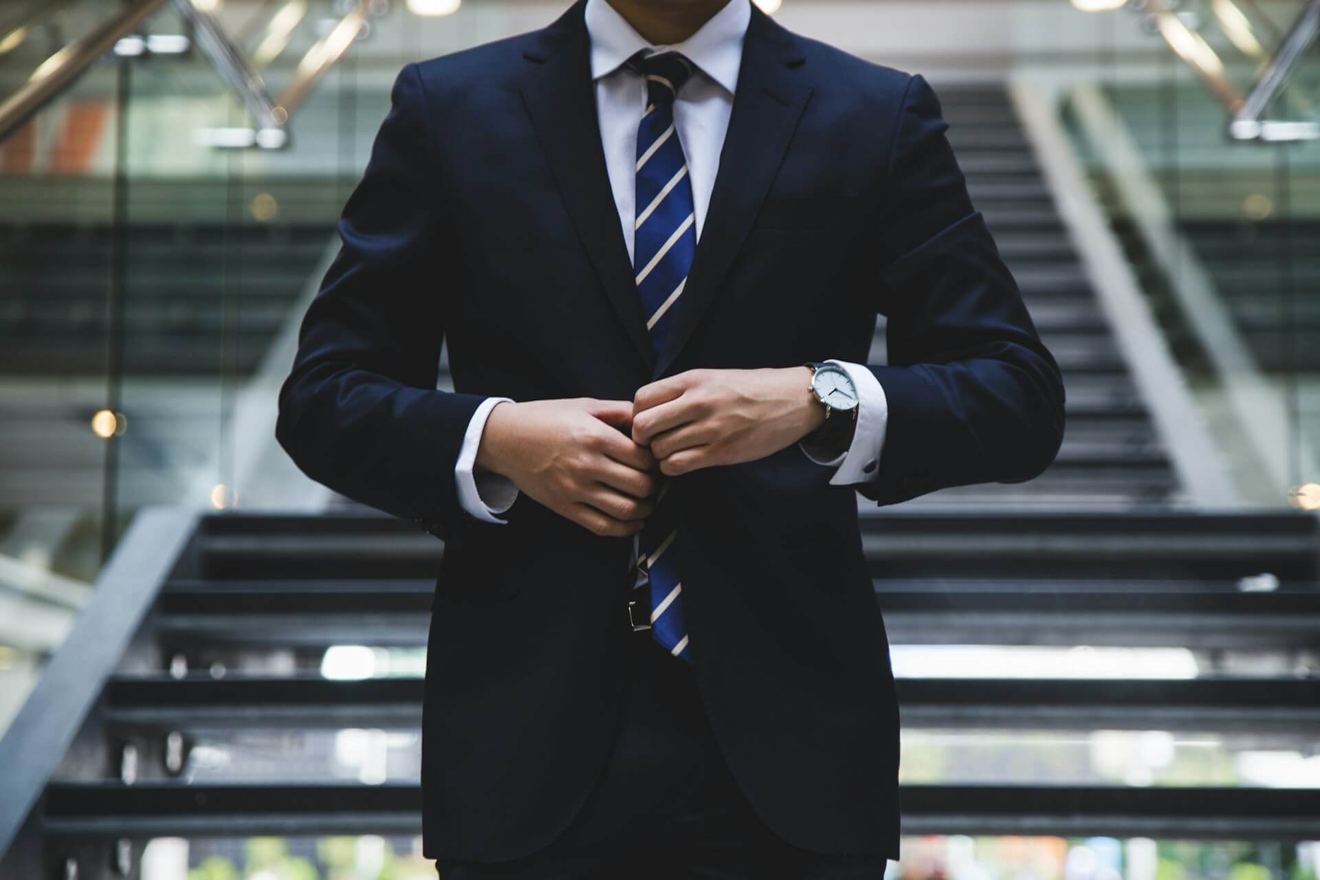 An SEO expert in a suit and tie ready to begin working for an enterprise business