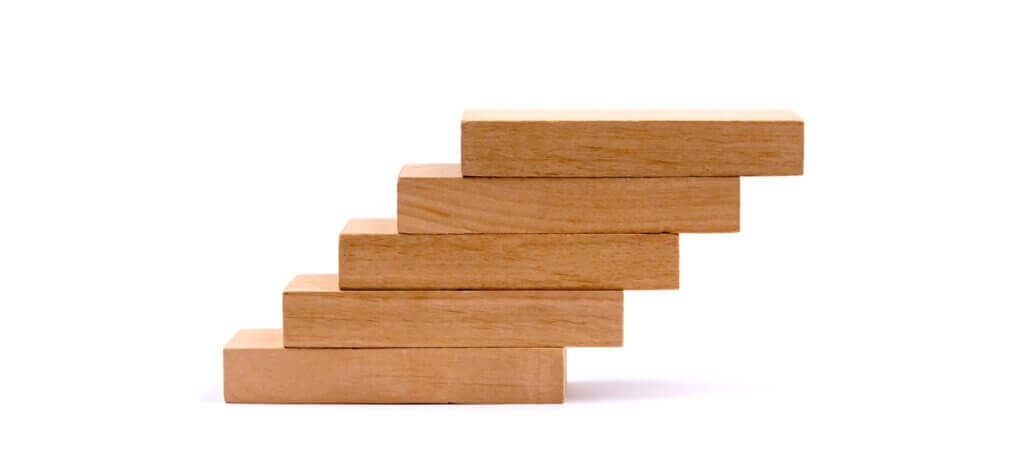 A stacked set of blocks that look like a staircase, representing the steps it takes to find a proper SEO consulting service